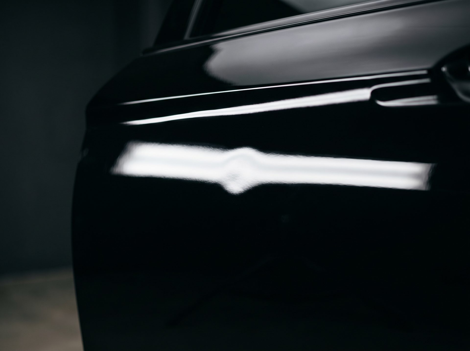 Glossy black door panel